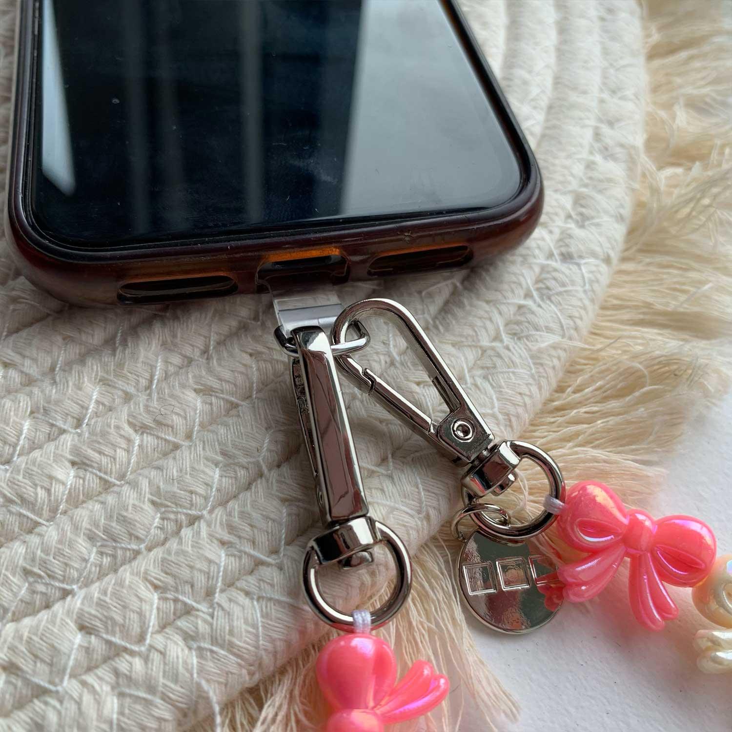 Cordon pour téléphone Bow – rose blanc – argent