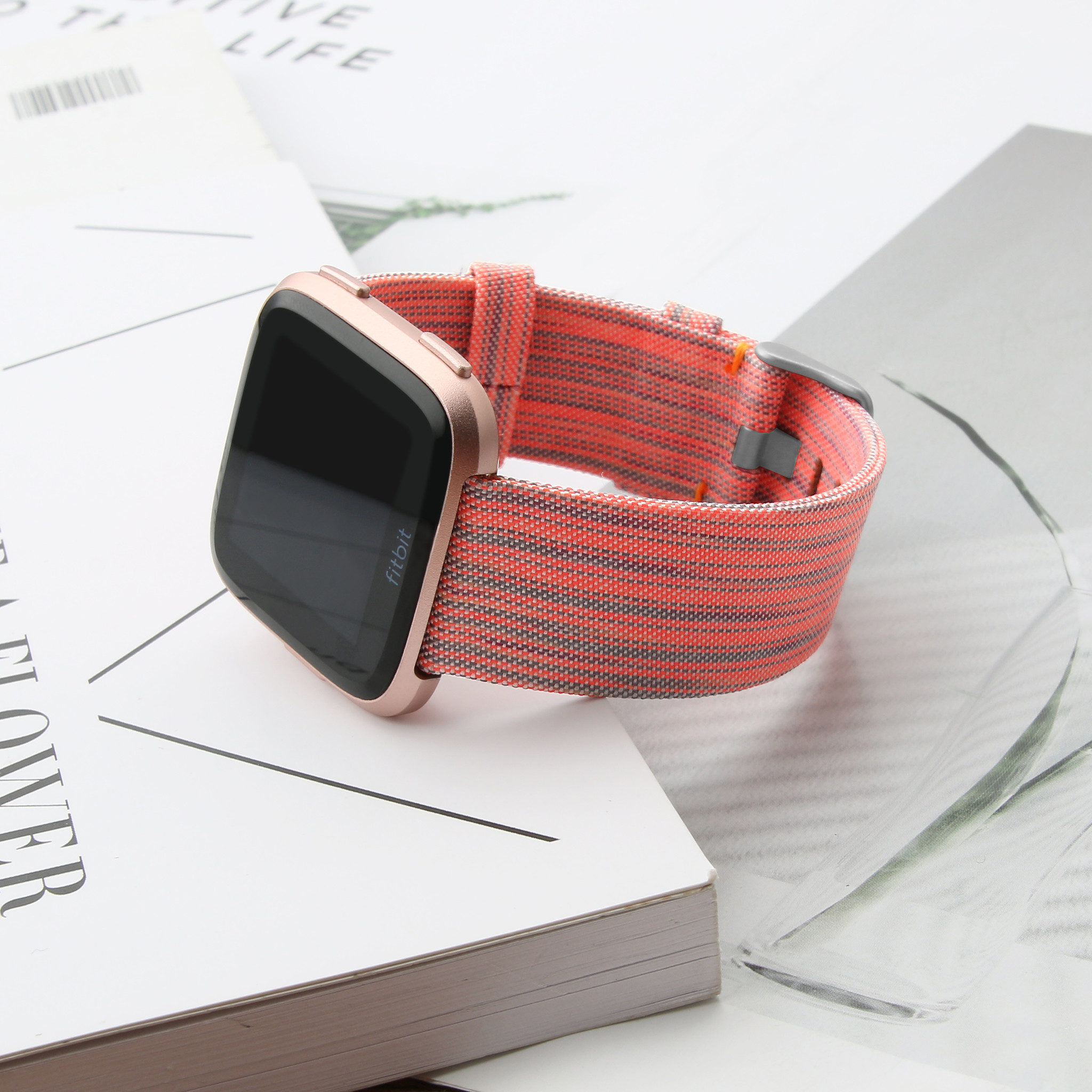 Bracelet boucle sport en nylon Fitbit Versa - orange rayé